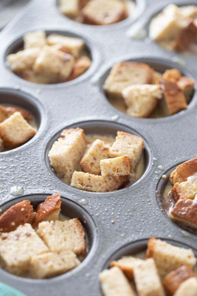 Bread cubes are in cupcake tins.