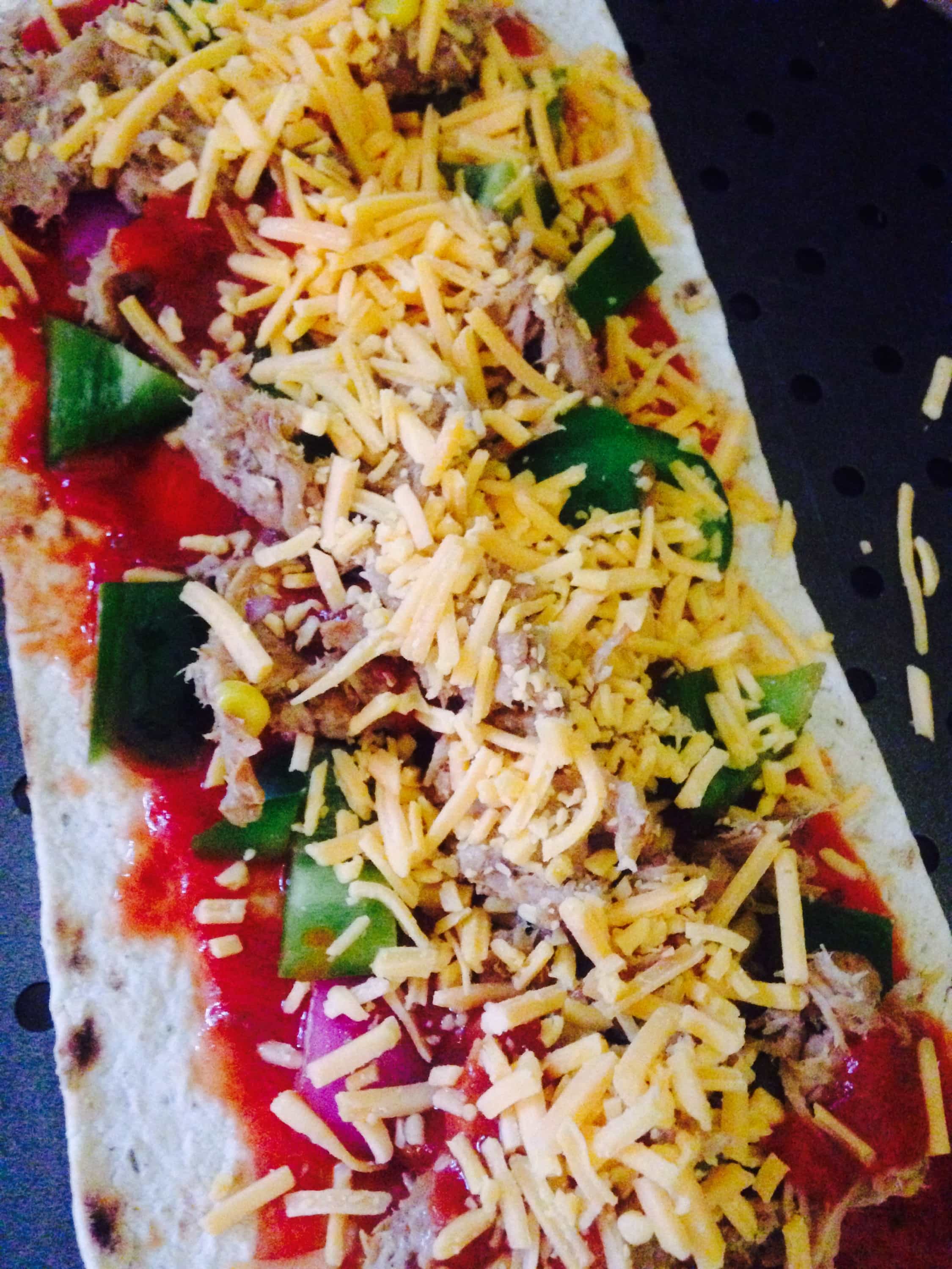 Pork Enchiladas Flatbread Pizza - a healthy comfort food, made with leftover pork carnitas, homemade enchilada sauce, peppers, onions, and cheddar cheese. It is a delicious, 21 Day Fix approved meal! 