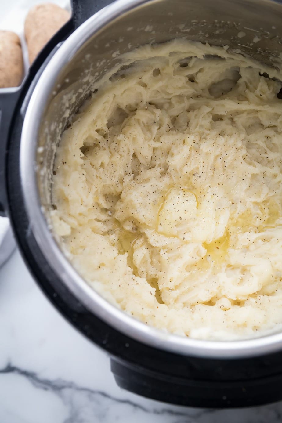 Mashed potatoes with melted vegan butter in an instant pot.