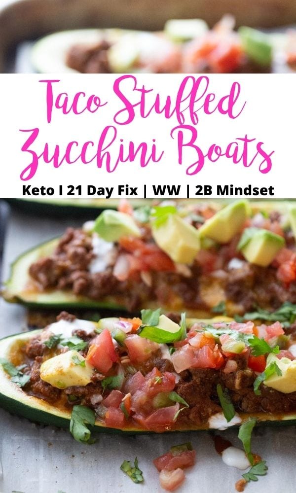 Close up photo of zucchini boats with a black and pink text overlay- Taco Stuffed Zucchini Boats | Keto | 21 Day Fix | WW | 2B Mindset