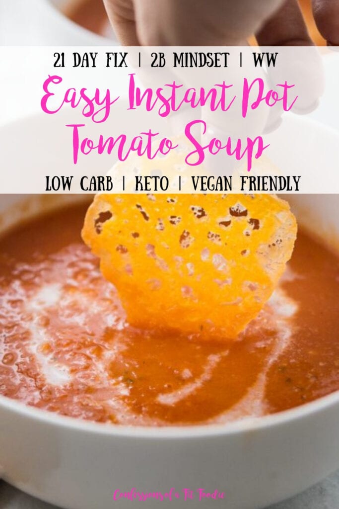 A woman's hand dipping a homemade crispy cheese chip into a white bowl of creamy tomato soup, with the text overlay- 21 Day Fix | 2B Mindset | WW | Easy Instant Pot Tomato Soup | Low Carb | Keto | Vegan Friendly