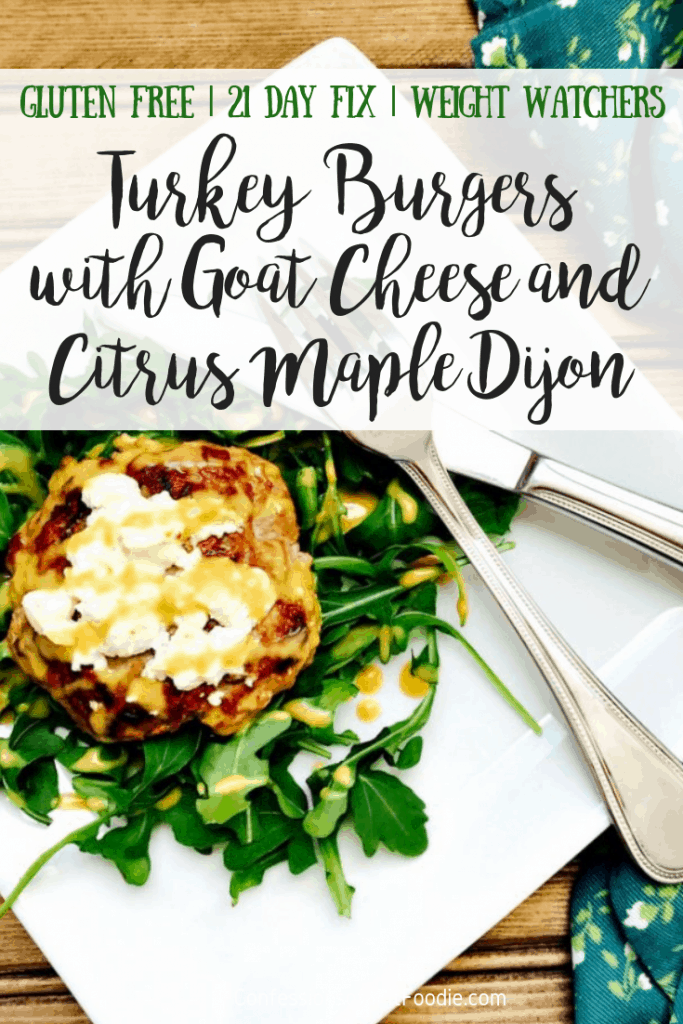 Overhead photo of an easy turkey burger on a bed of arugula, with a green and black text overlay - Gluten Free | 21 Day Fix | Weight Watchers | Turkey Burgers with Goat Cheese and Citrus Maple Dijon